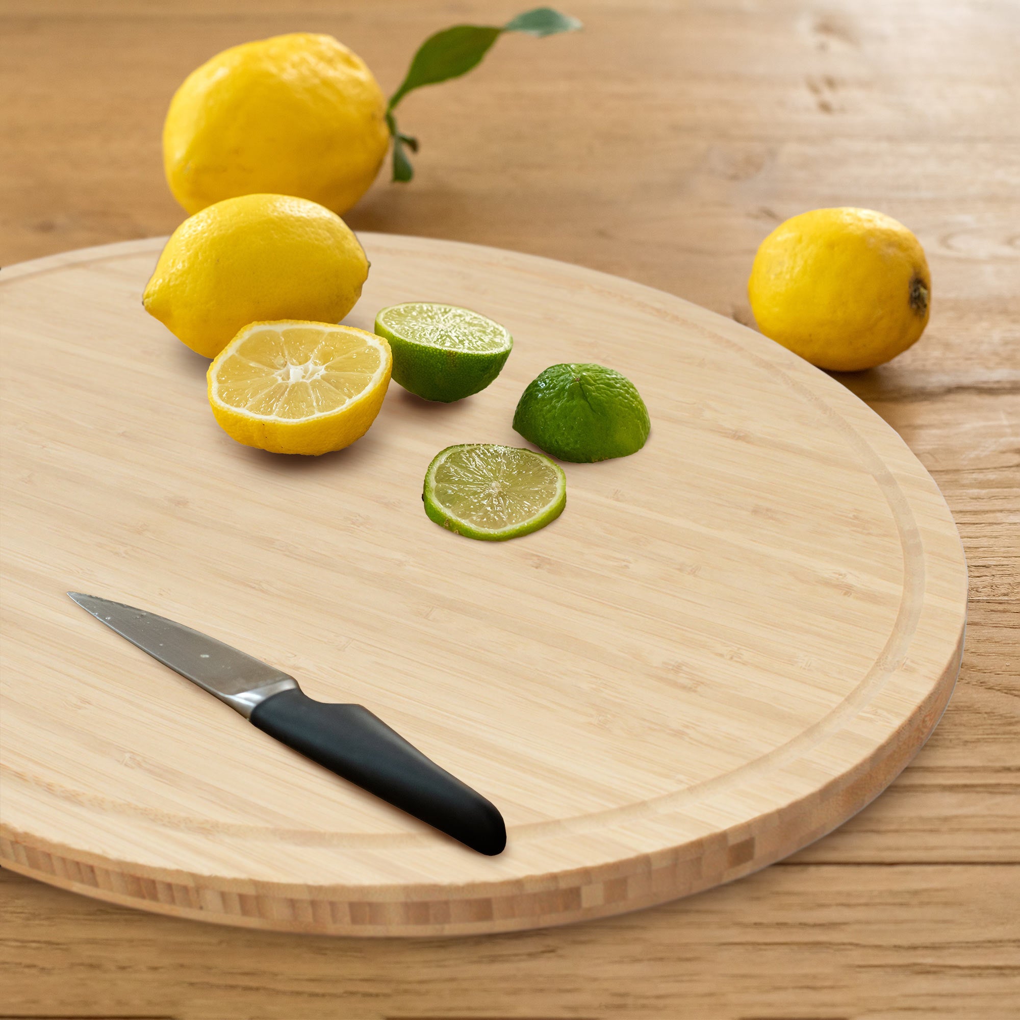 Grooved Oval Bamboo Cutting Board - Image 5